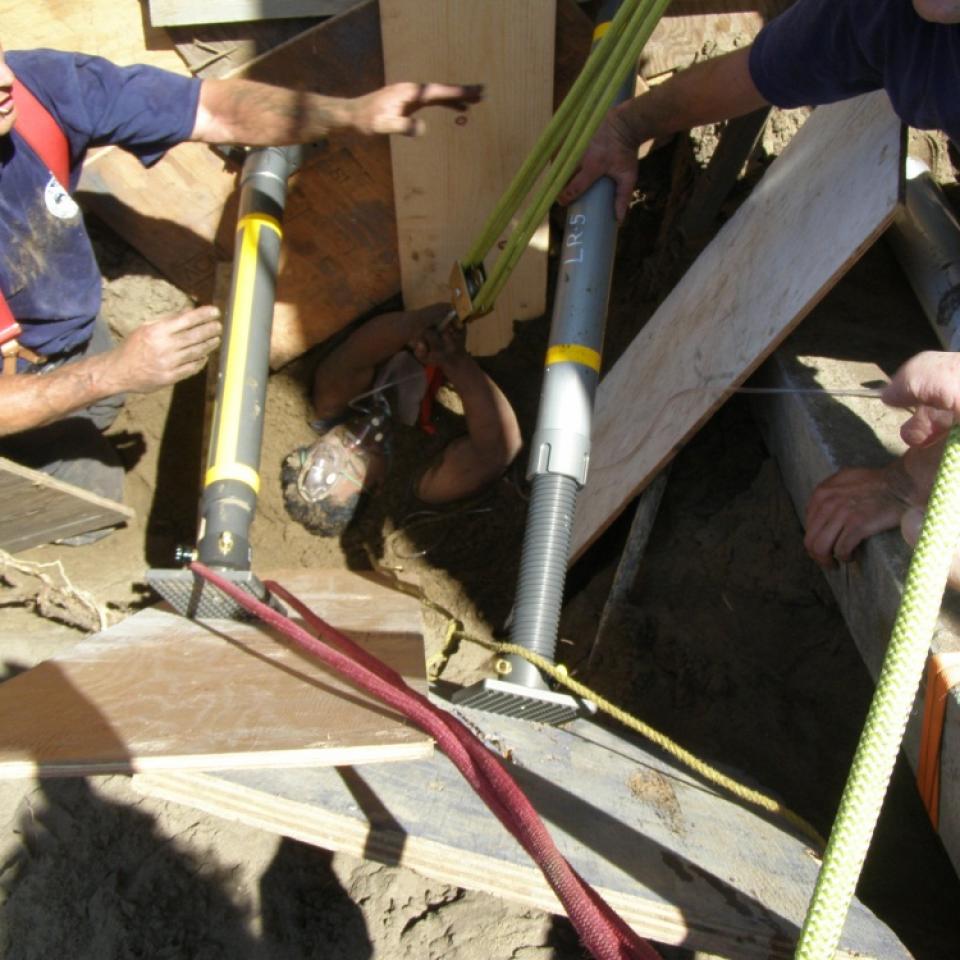 Rescue Incident (July 13, 2010)   Shoring up sides before removing worker trapped in collapsed trench